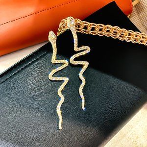 CRYSTAL SNAKE SHAPED DANGLE EARRINGS